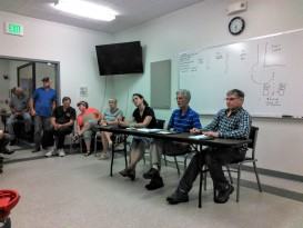 CLA President and meeting moderator Malcolm Burson sits between State Representative Deb Sanderson and State Senator Christopher Johnson near the end of the August 26th meeting of Clary Lake shore owners and town of Whitefield representatives. Photograph by George Fergusson 26 August 2015